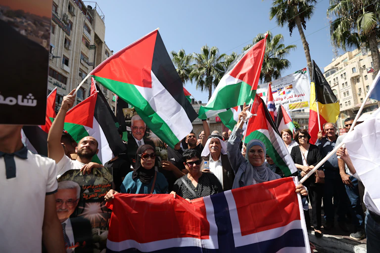 Palestinians celebrate countries recognising their statehood in Ramallah on the West Bank, September 2025.