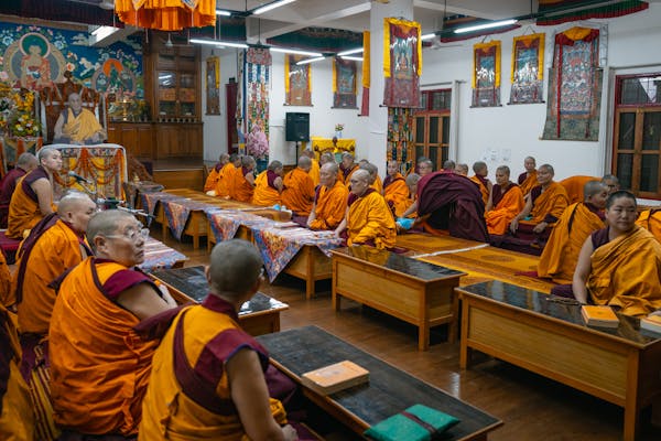 A group of Tibetan Buddhist guns gather together.