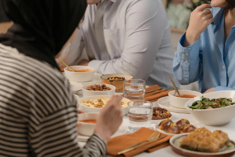 A group of people eating a meal