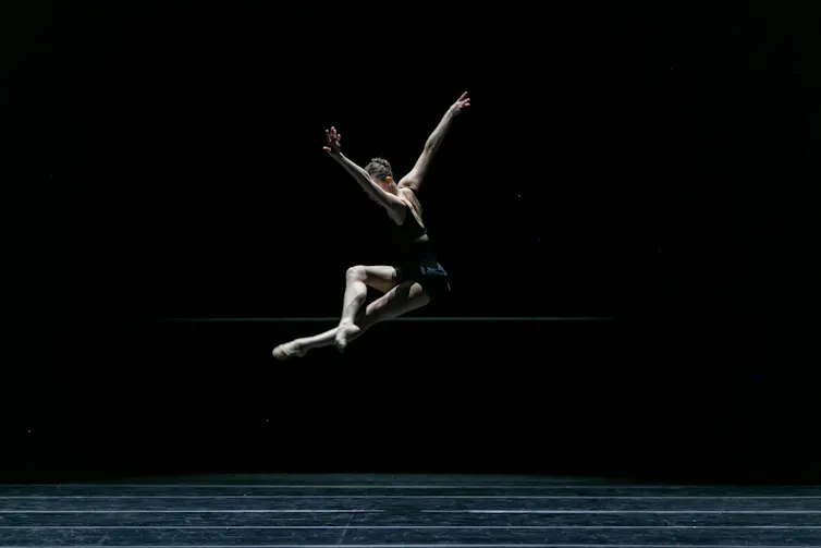 A woman in a stunning leap.