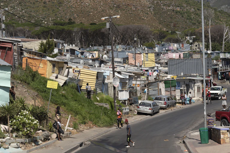 A densely populated area of tin one roomed shacks built very close together