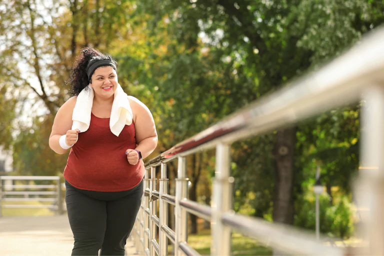 A woman jogging.