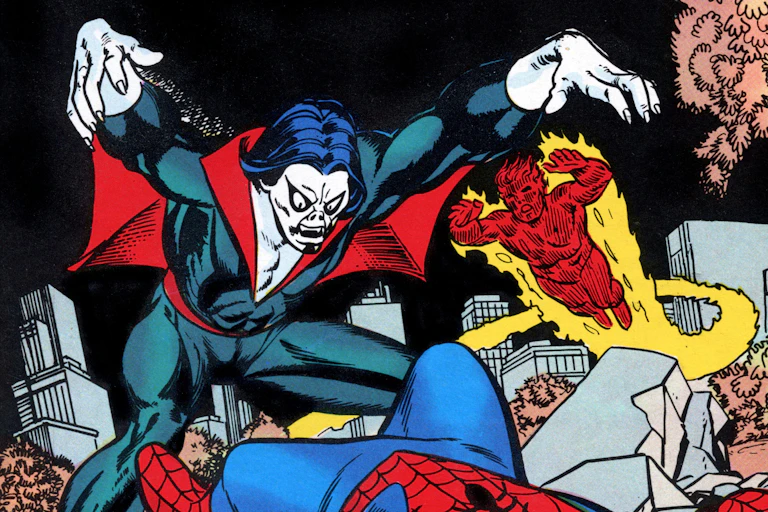 Morbius attacks Spider-Man, who lies on the floor