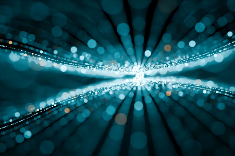An abstract visualisation of a futuristic quantum circuit with glowing nodes and connections