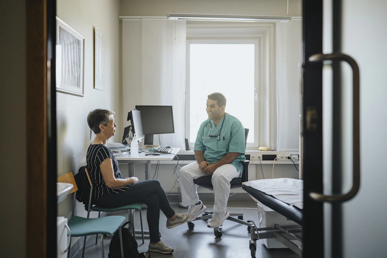 Doctor talks to patient