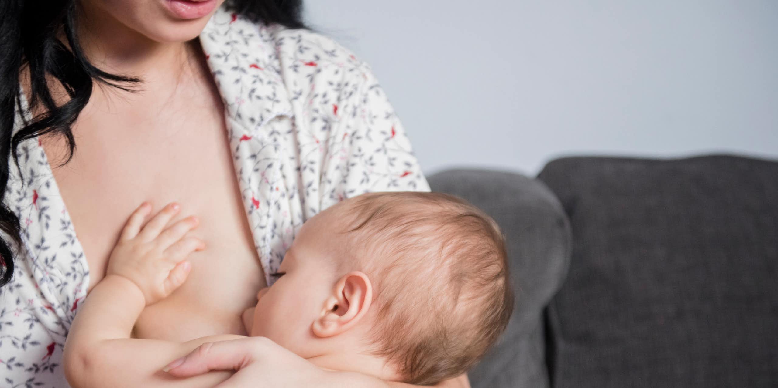 Person breastfeeding baby