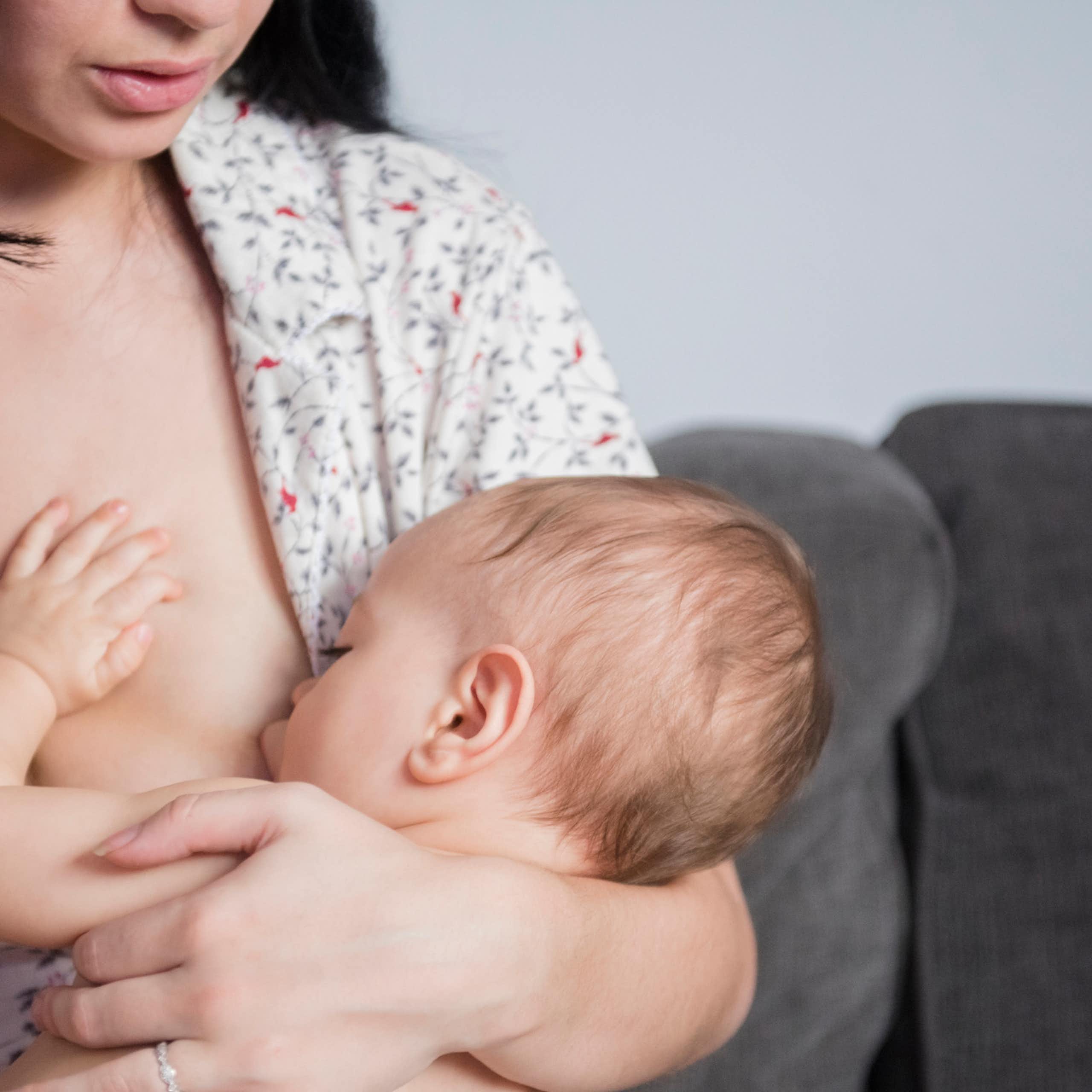 Person breastfeeding baby