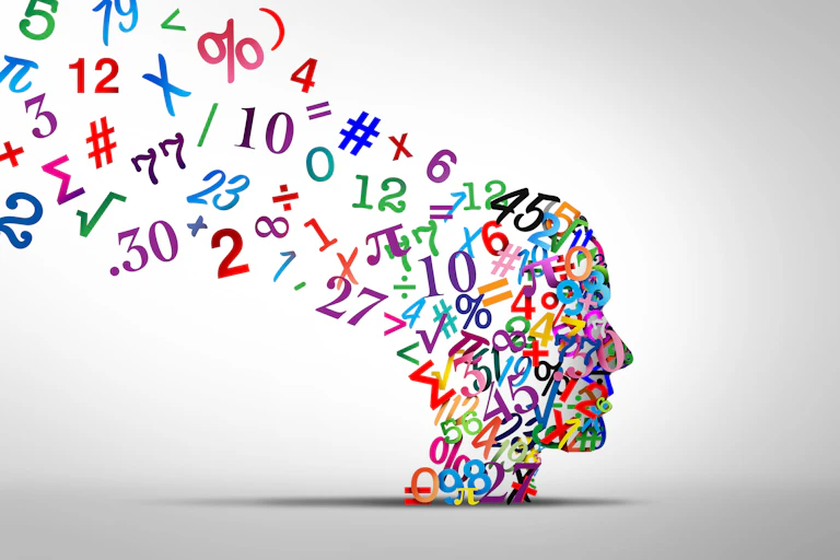 A profile view of a person's head, but it is made out of colourful numbers. A bunch of numbers are floating out of the frame, away from the top of the head.
