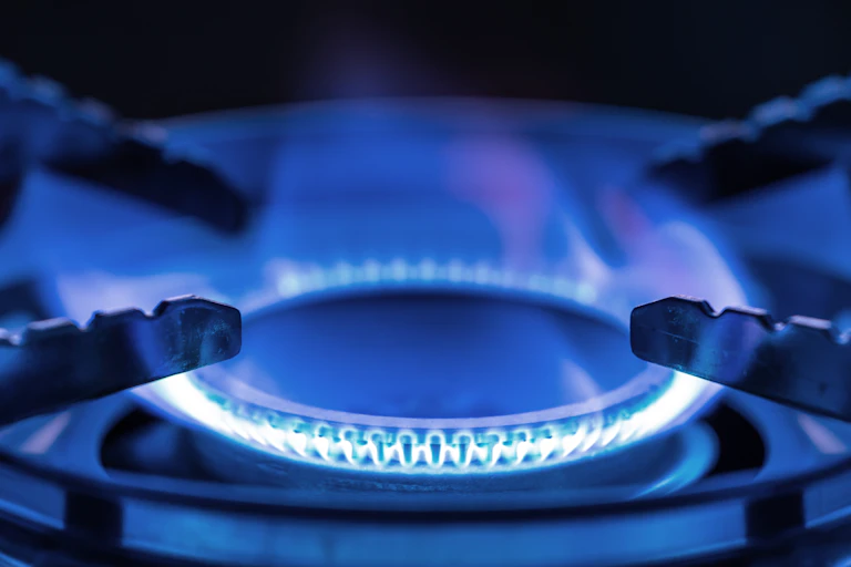 a close up image of a gas burner.
