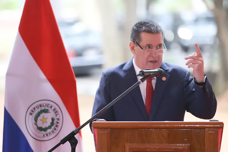 Former Paraguayan president, Horacio Cartes, delivers a speech.