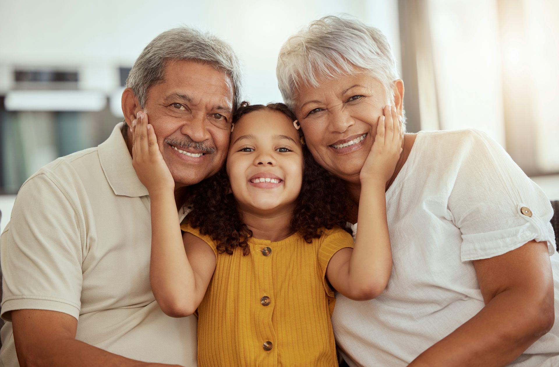 Happy grandparents and granddaughter