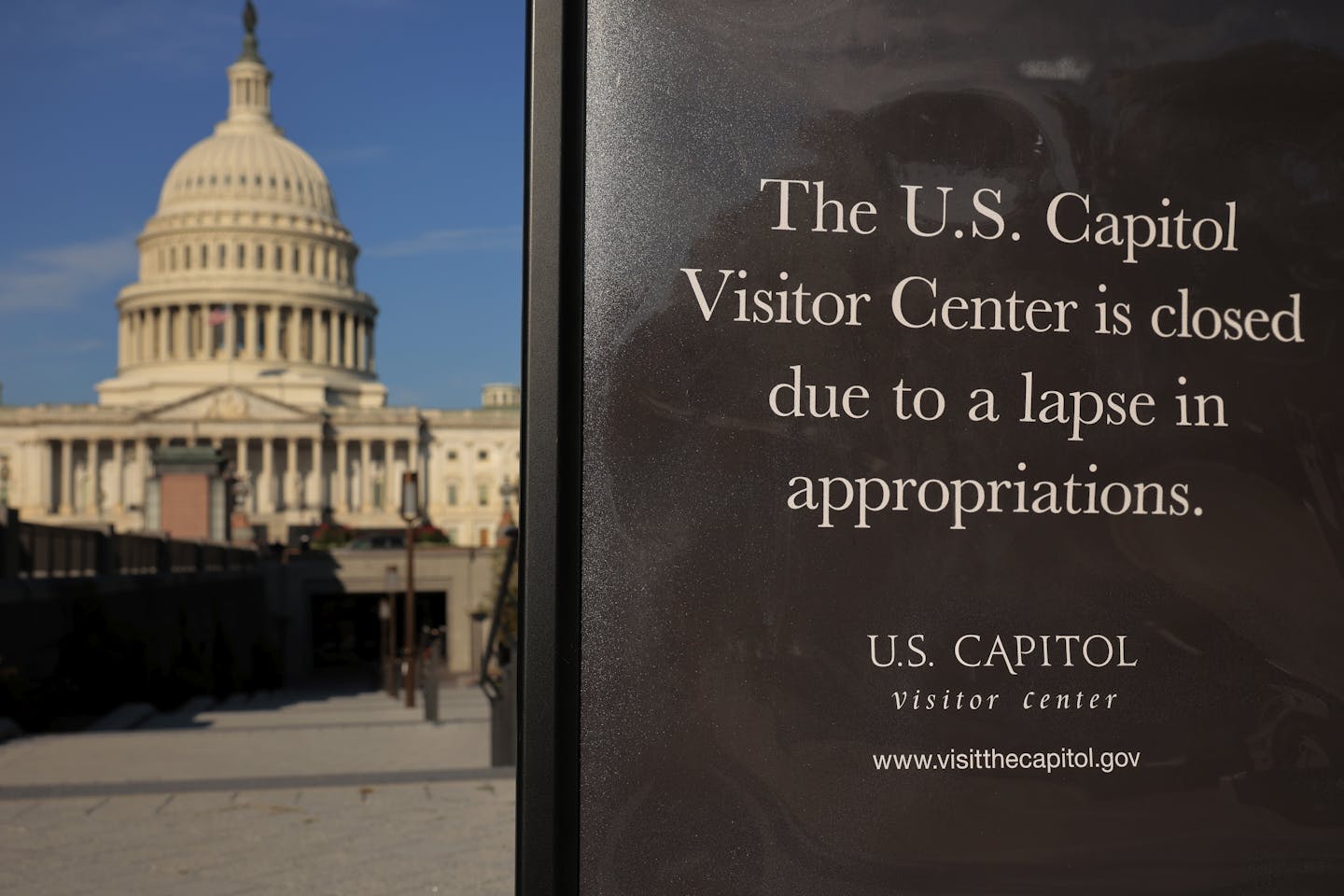 A sign reads 'The US Capitol Visitors Center is closed due to a lapse in appropriations.'