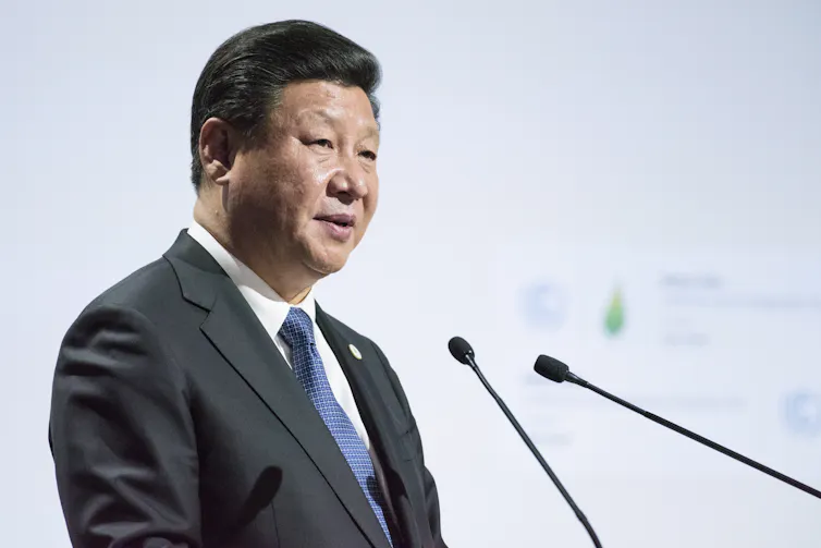 Xi on stage