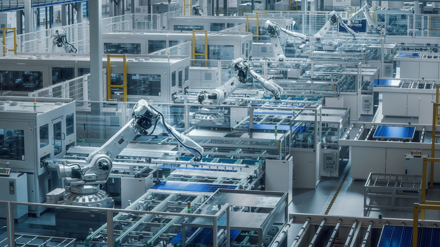 Large factory production line with industrial robot arms