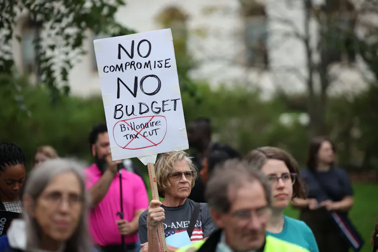 Protesters on September 30, 2025, at a rally against cuts to health care