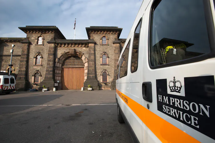 A prison service van pulling up to the gates of HMP Wandsworth
