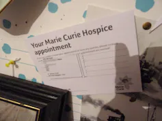 Liz's hospice appointment card.
