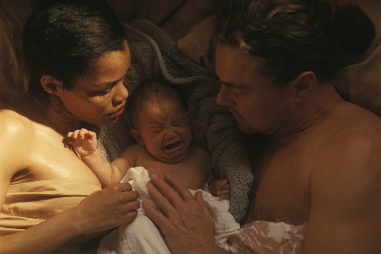 Teyana Taylor and Leonardo DiCaprio with a baby