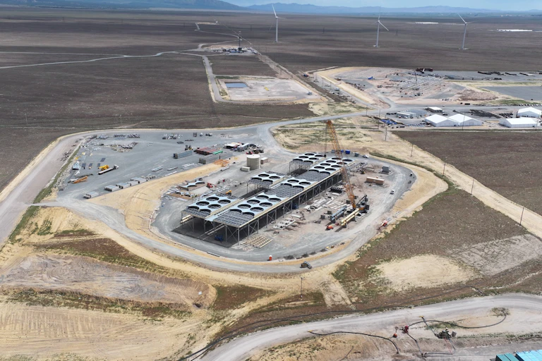 A large area of land has buildings and roads under construction.