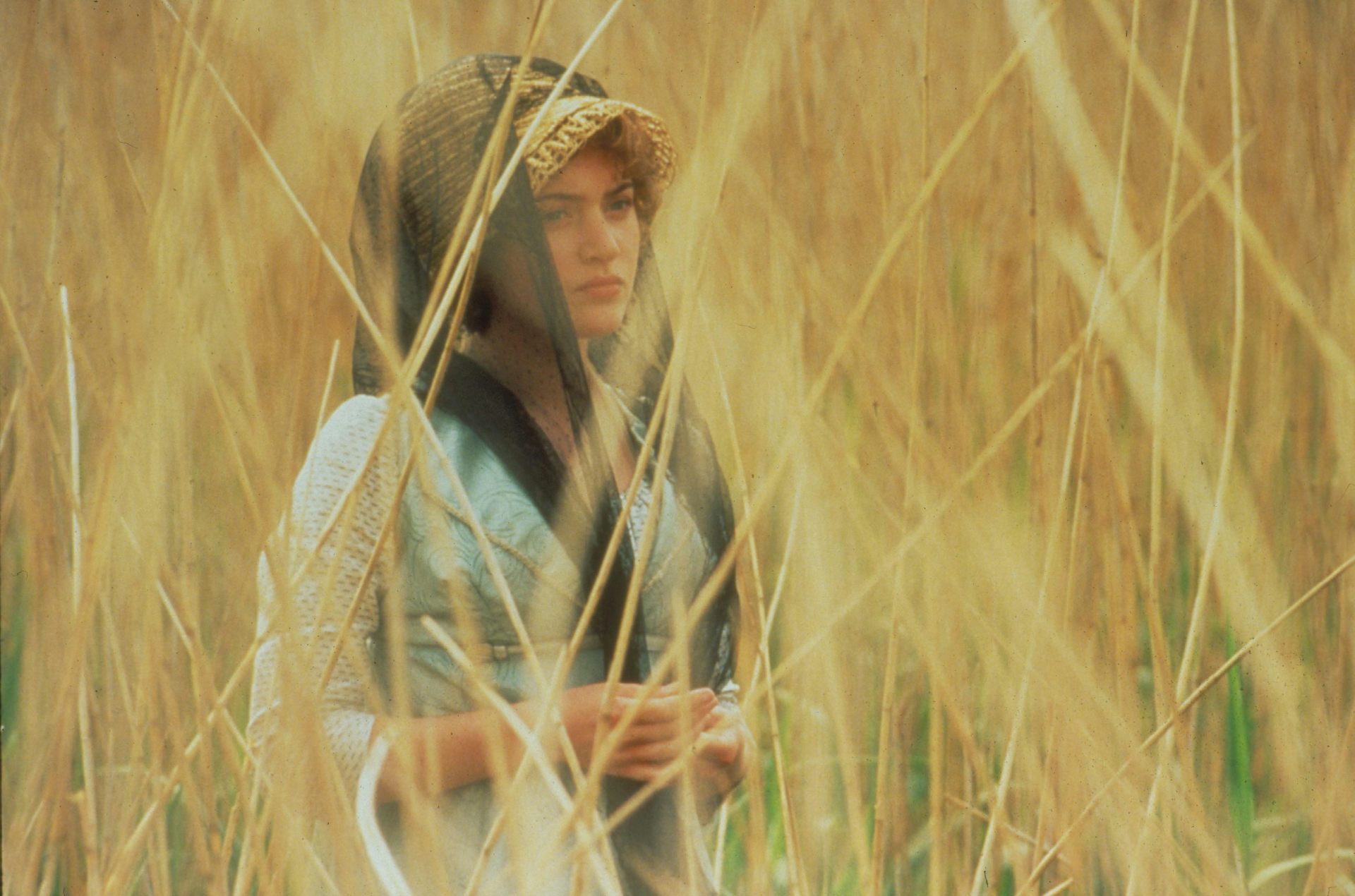 Kate Winslet as Marianne Dashwood in a wheat field
