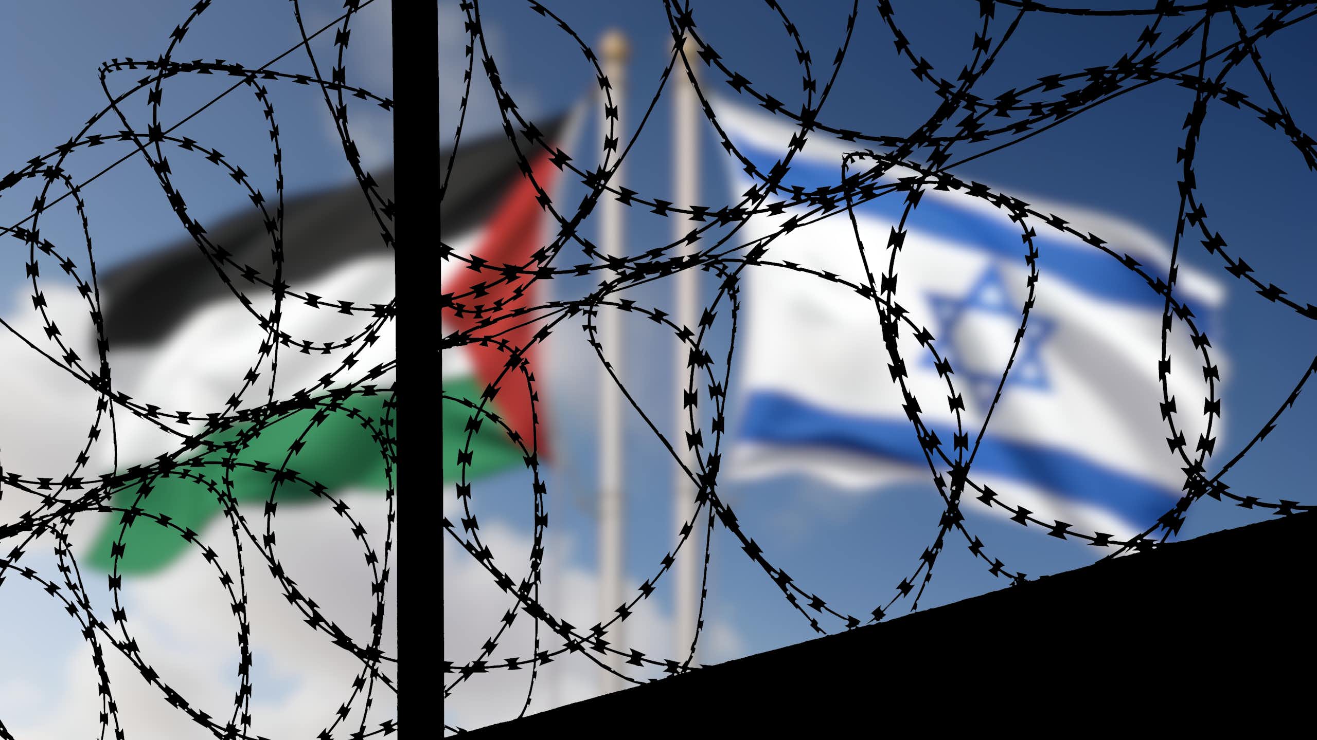 A composite picture of an Israeli flag and a Palestinian flag with barbed wire in the foreground.