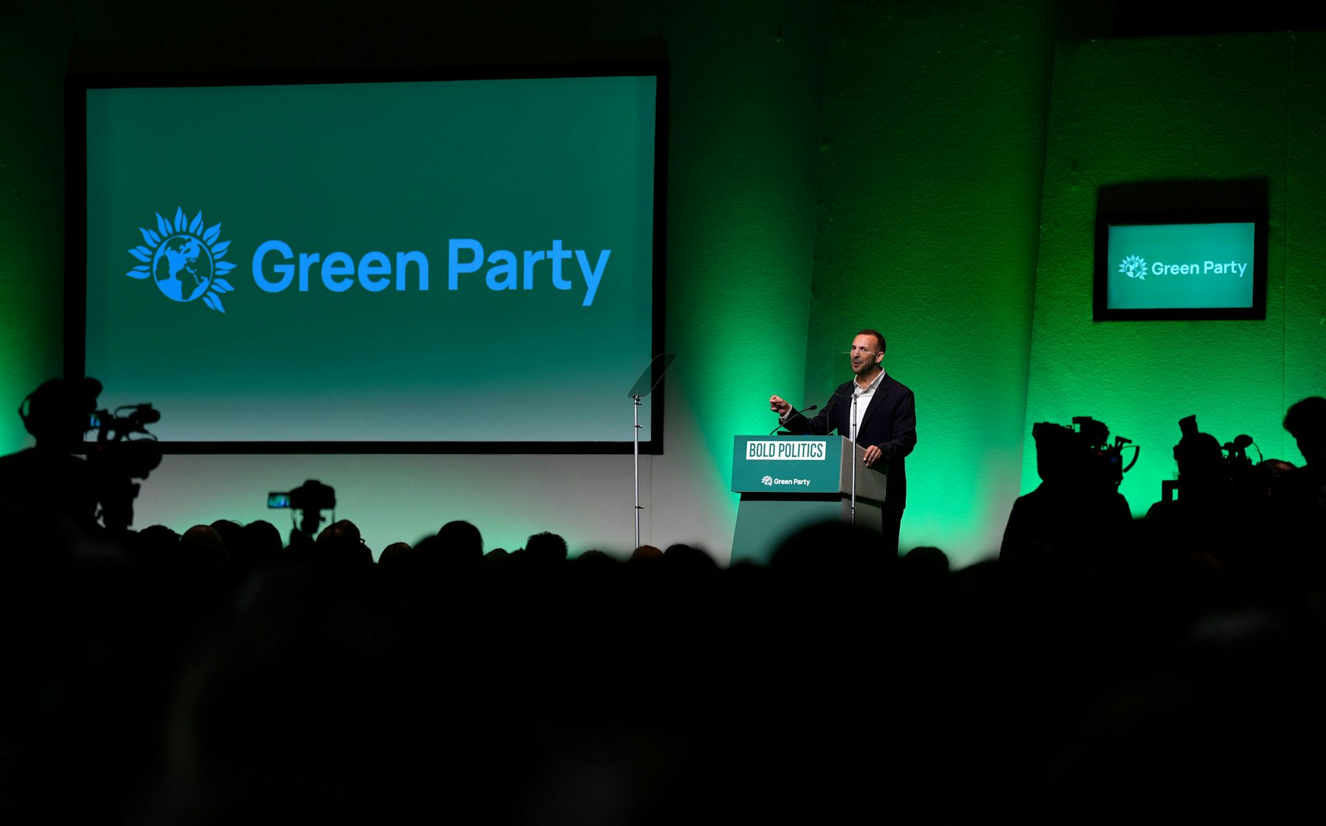 Zack Polanski giving a speech.