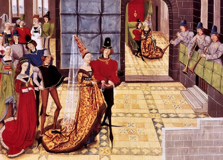 Painting depicting various aristocrats wearing pointy shoes at a banquet