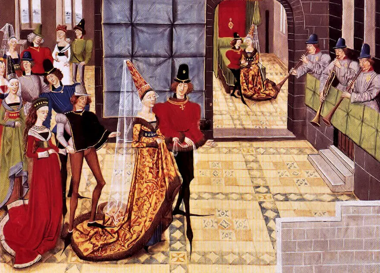 Painting depicting various aristocrats wearing pointy shoes at a banquet