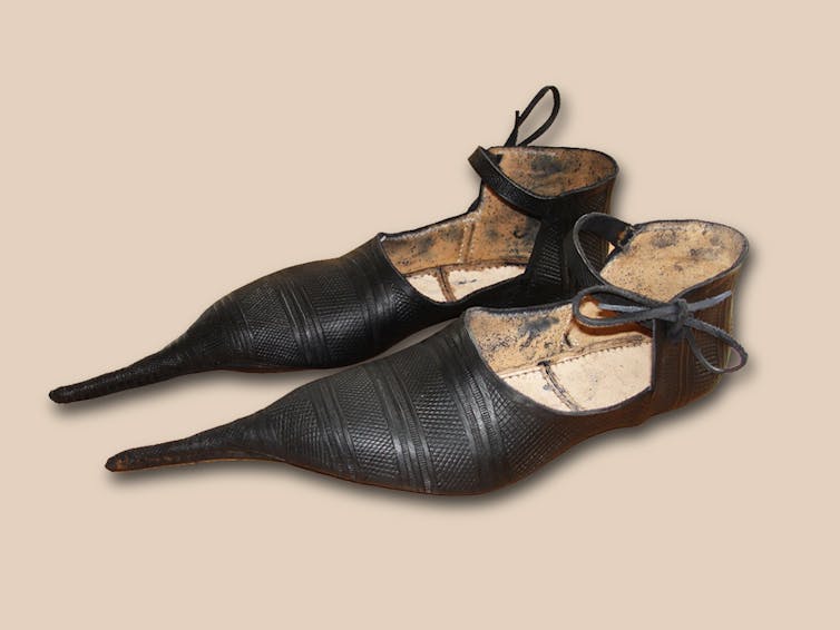 Black shoes with long, pointed tips