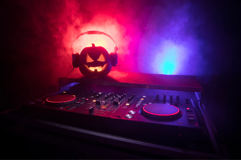 A pumpkin wearing headphones