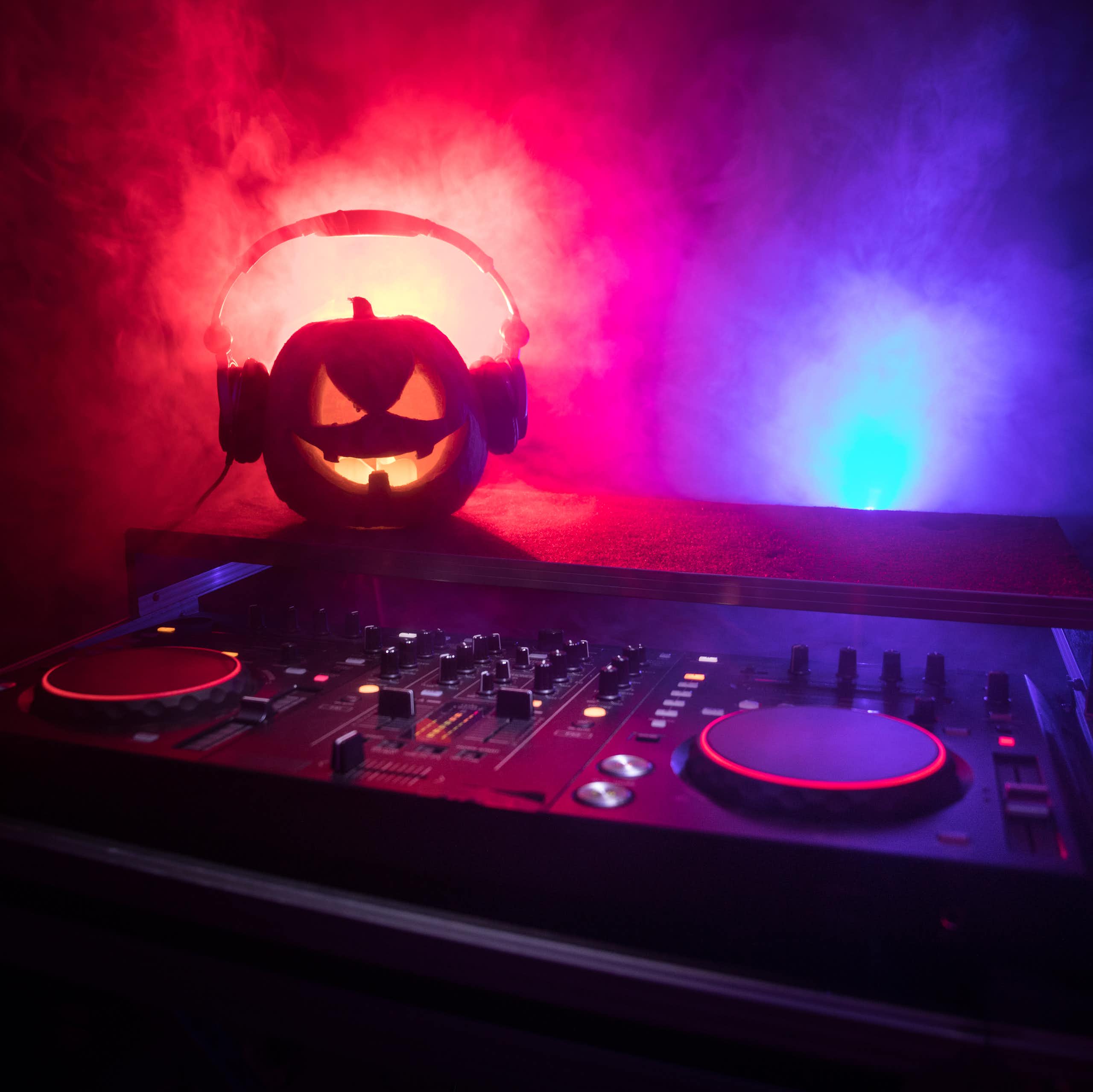 A pumpkin wearing headphones