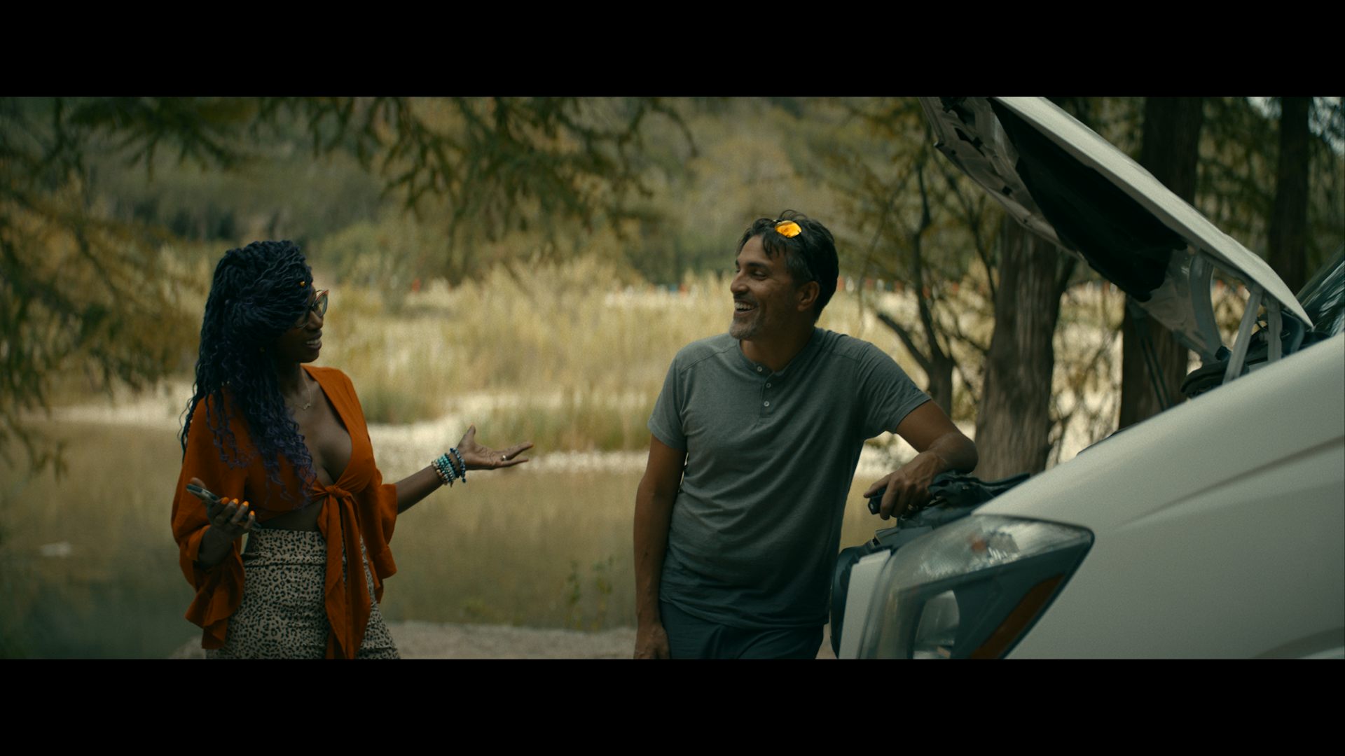 Two people laughing together