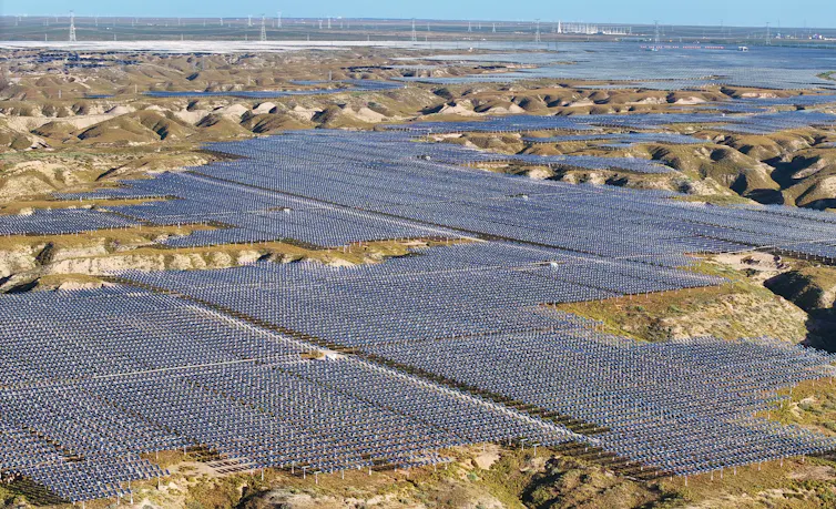 An aerial shot of a a huge swathe of solar panels in China.