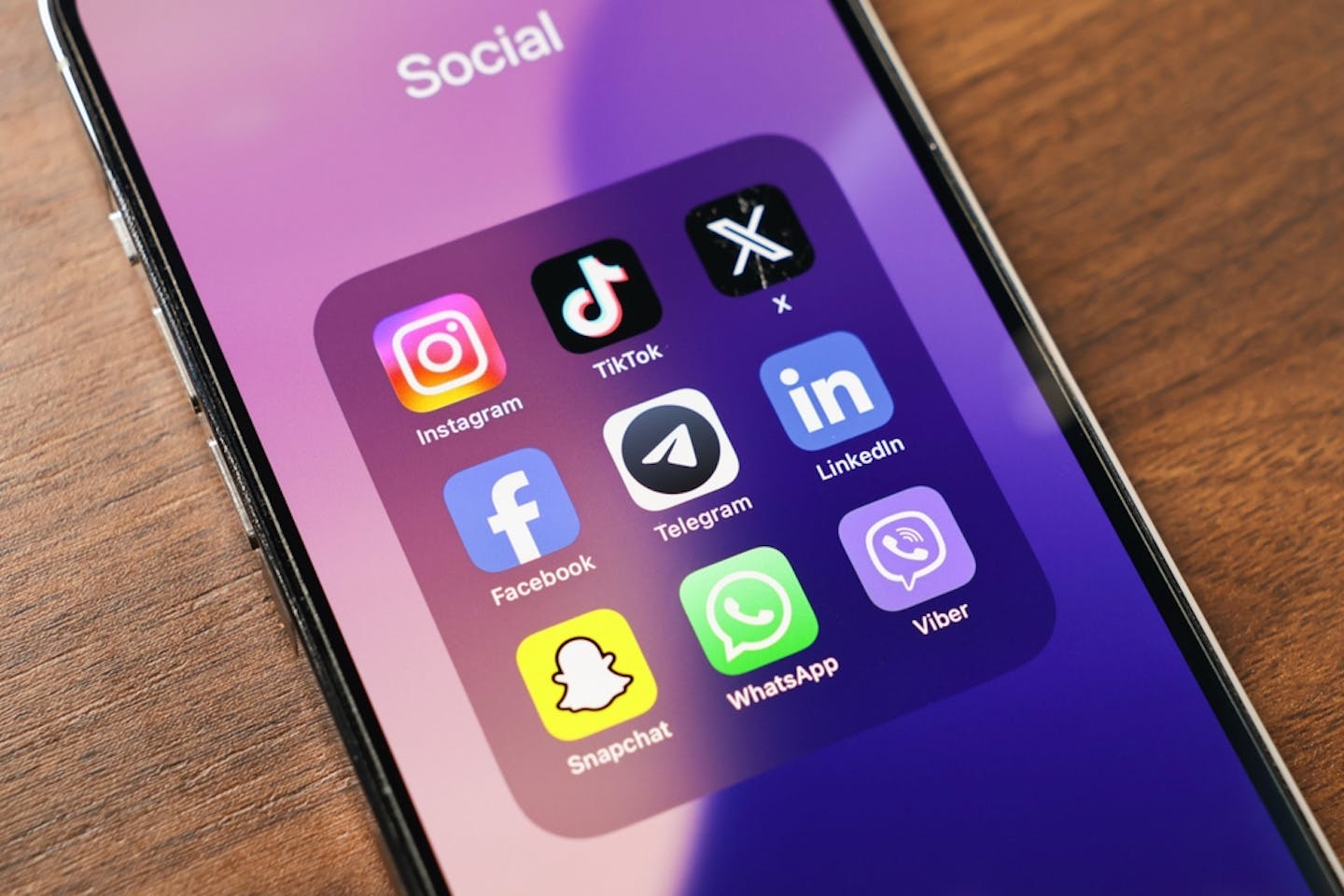 A phone screen showing a number of different social media apps.