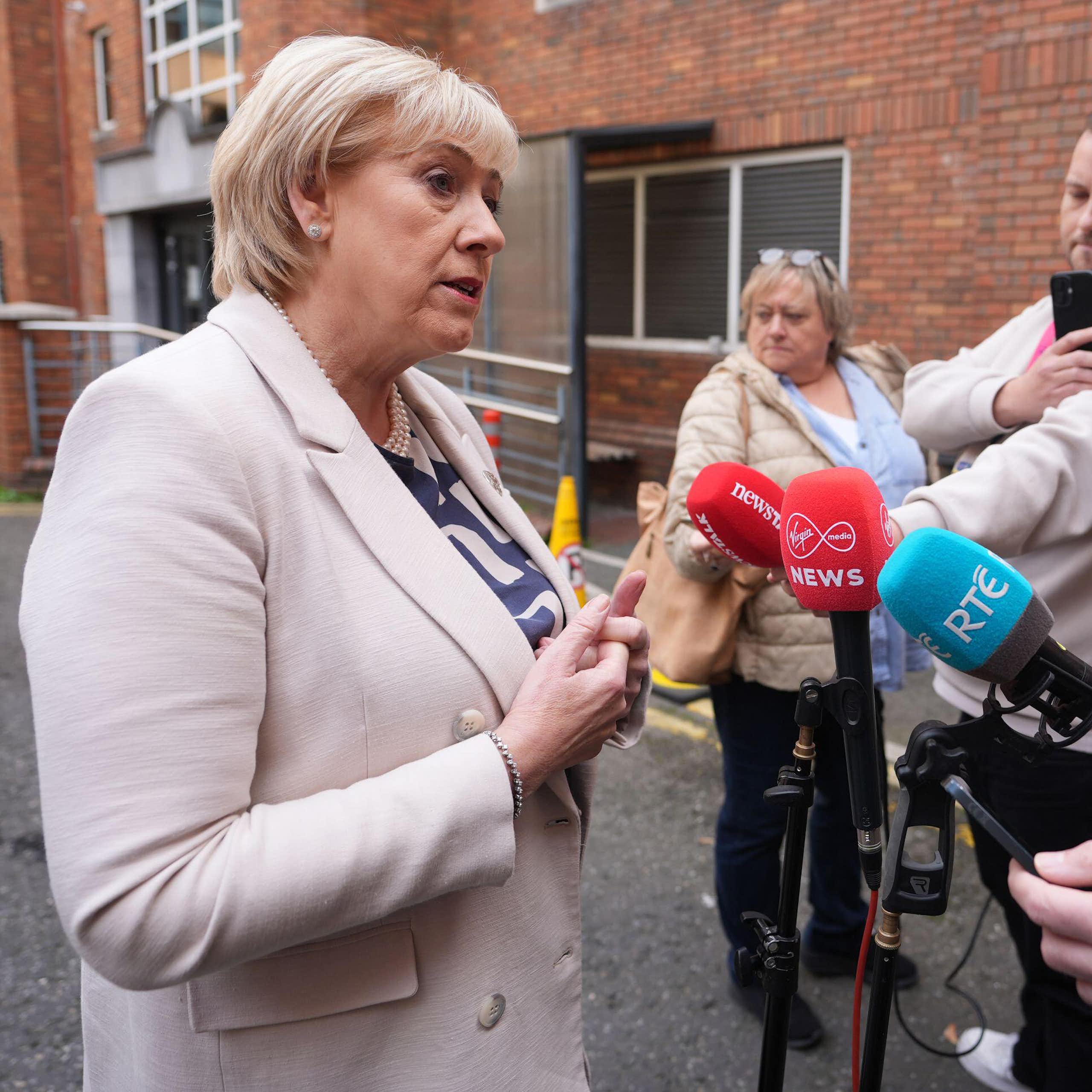 Heather Humphreys talking to reporters.