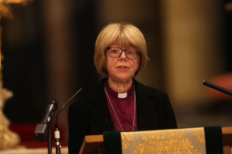 Mullally gives a speech after her appointment