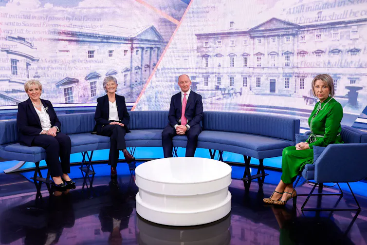 Heather Humprheys, Catherine Connolly and Jim Gavin sitting on a sofa in a TV studio with a presenter.