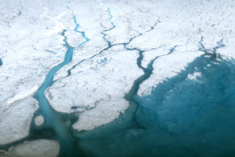 An aerial view of meltwater on the ice sheet