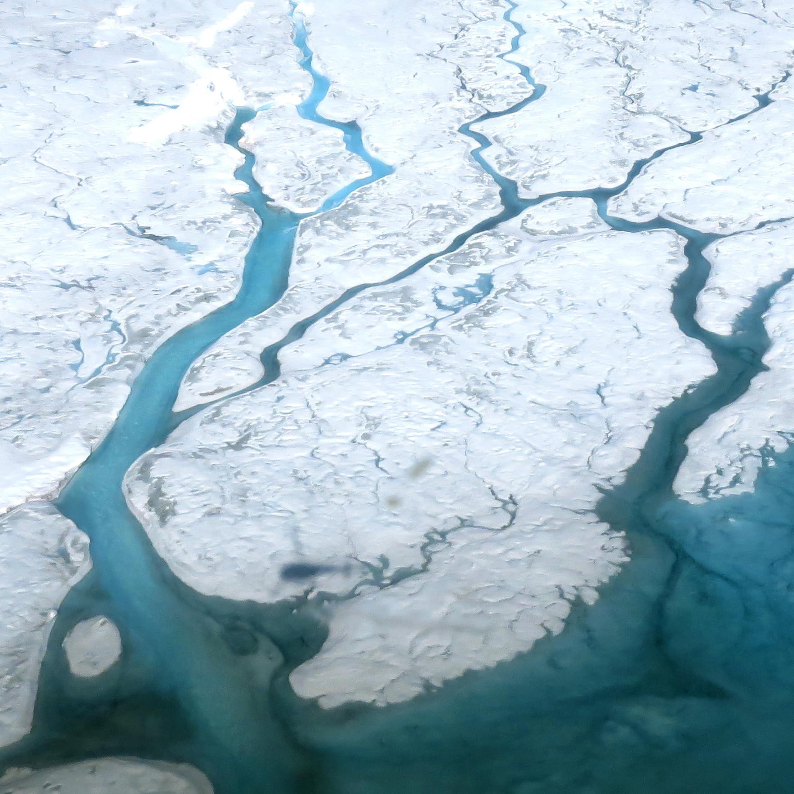 An aerial view of meltwater on the ice sheet