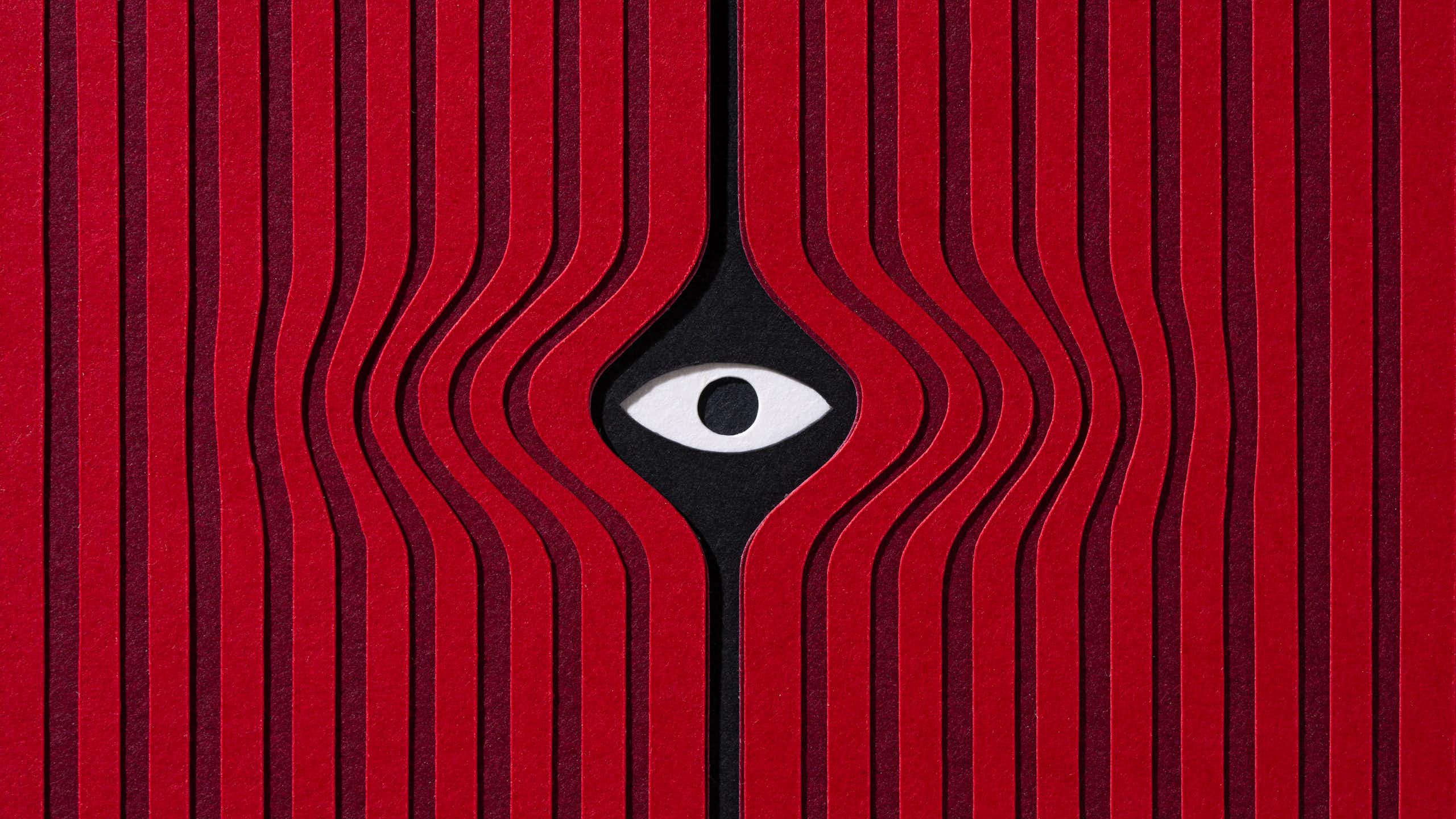 A graphic with red stripes and an eye peeking through in the middle