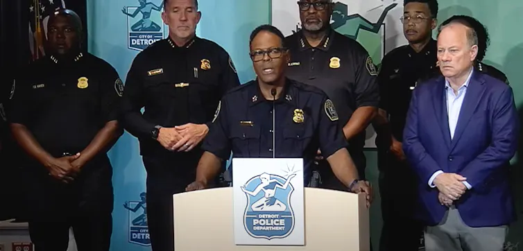 Detroit police chief stands behind podium