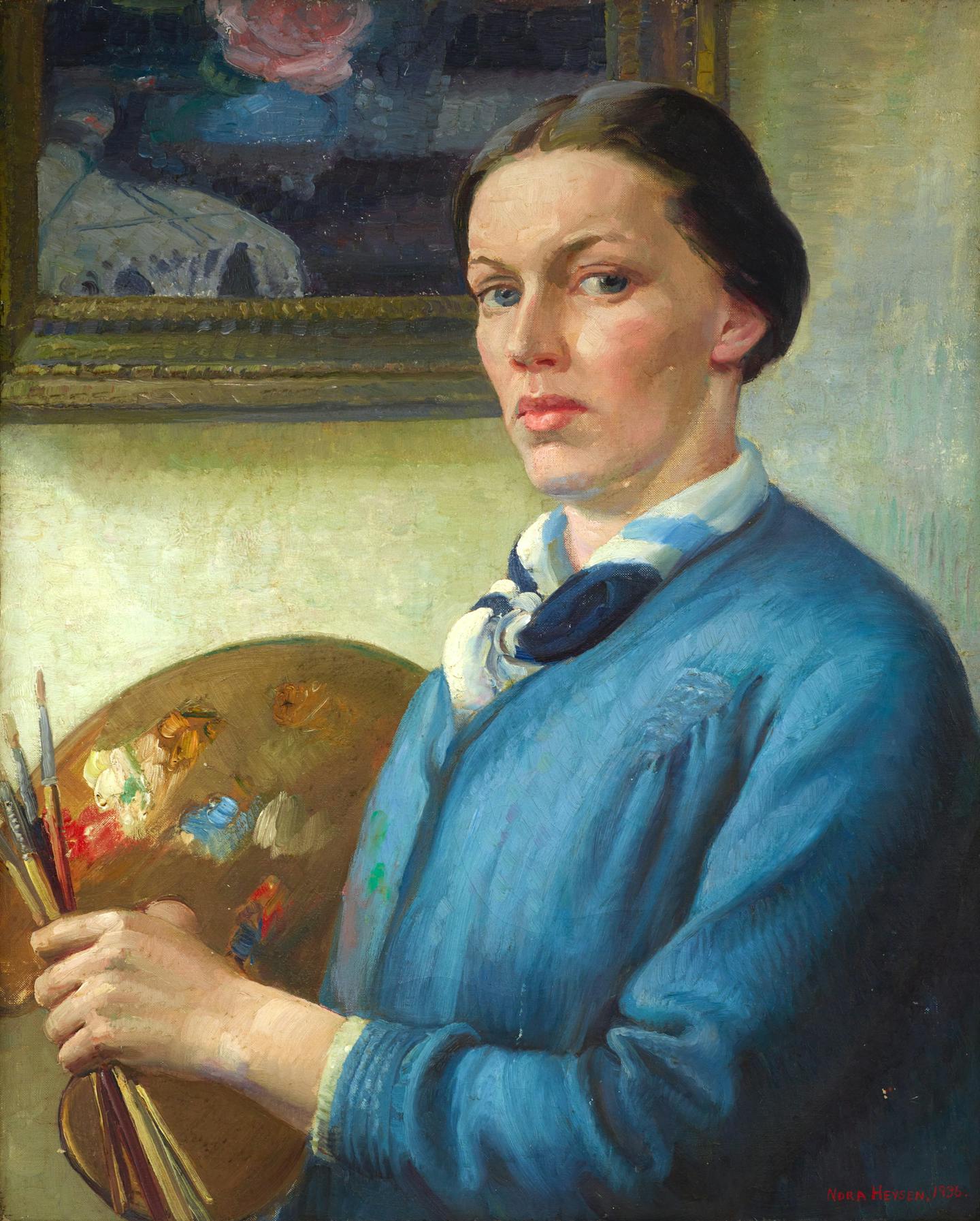 The artist holds a paint palette.