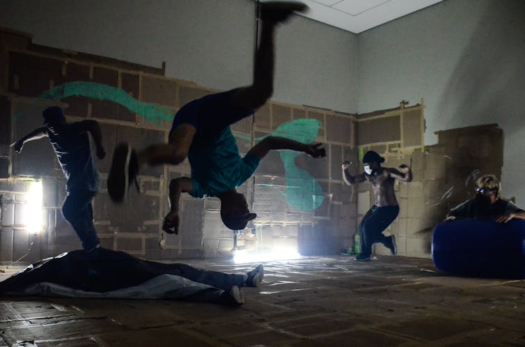 A man flips in the air.