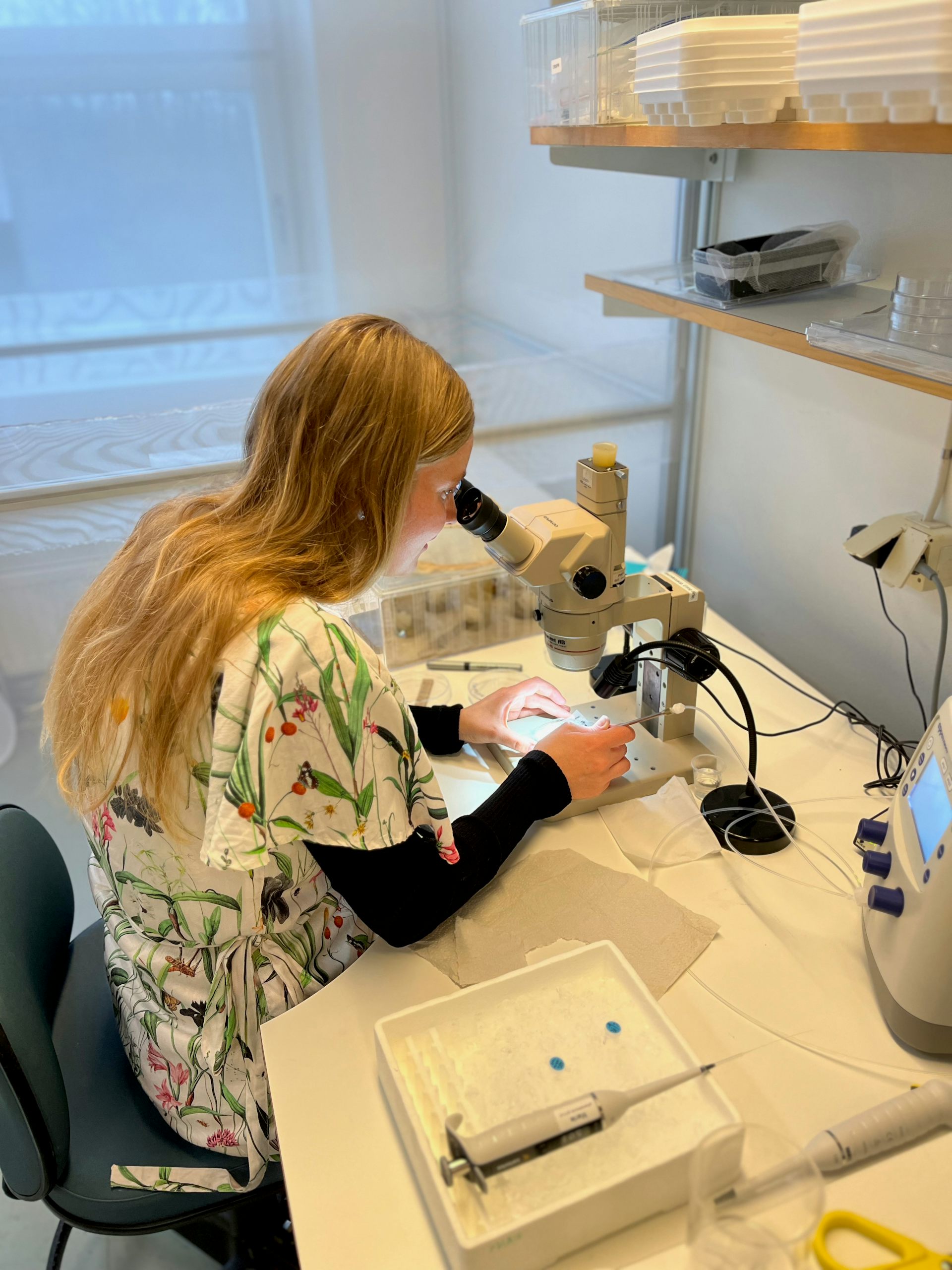 Woman using lab equipment