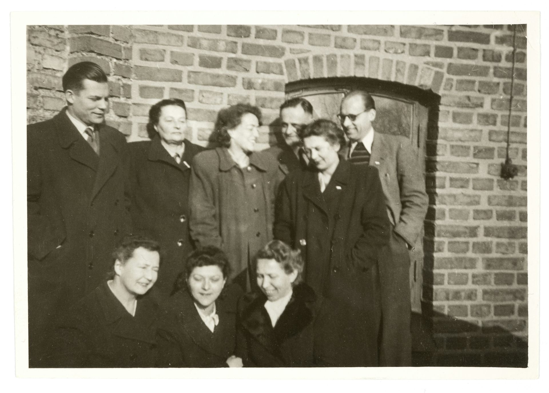 Black and white photo of a group of colleagues