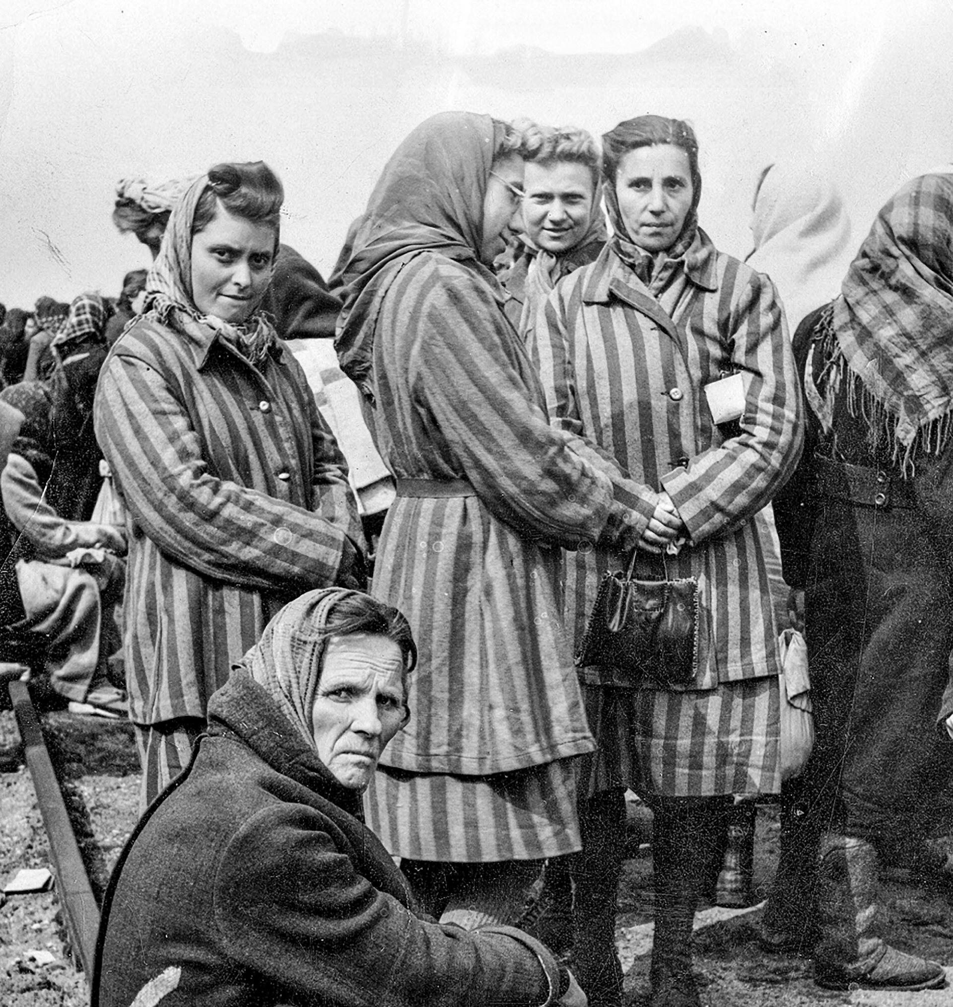 Female concentration camp prisoners in prison uniform.