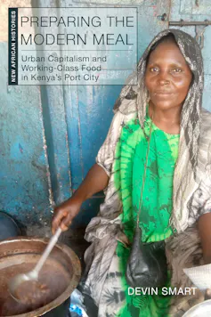 A book cover featuring a photo of an African woman stirring a large pot.