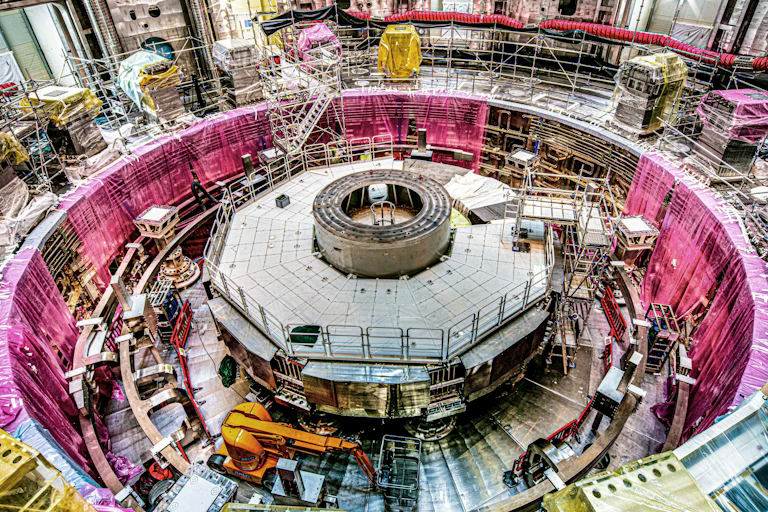 A large circular machine under construction.