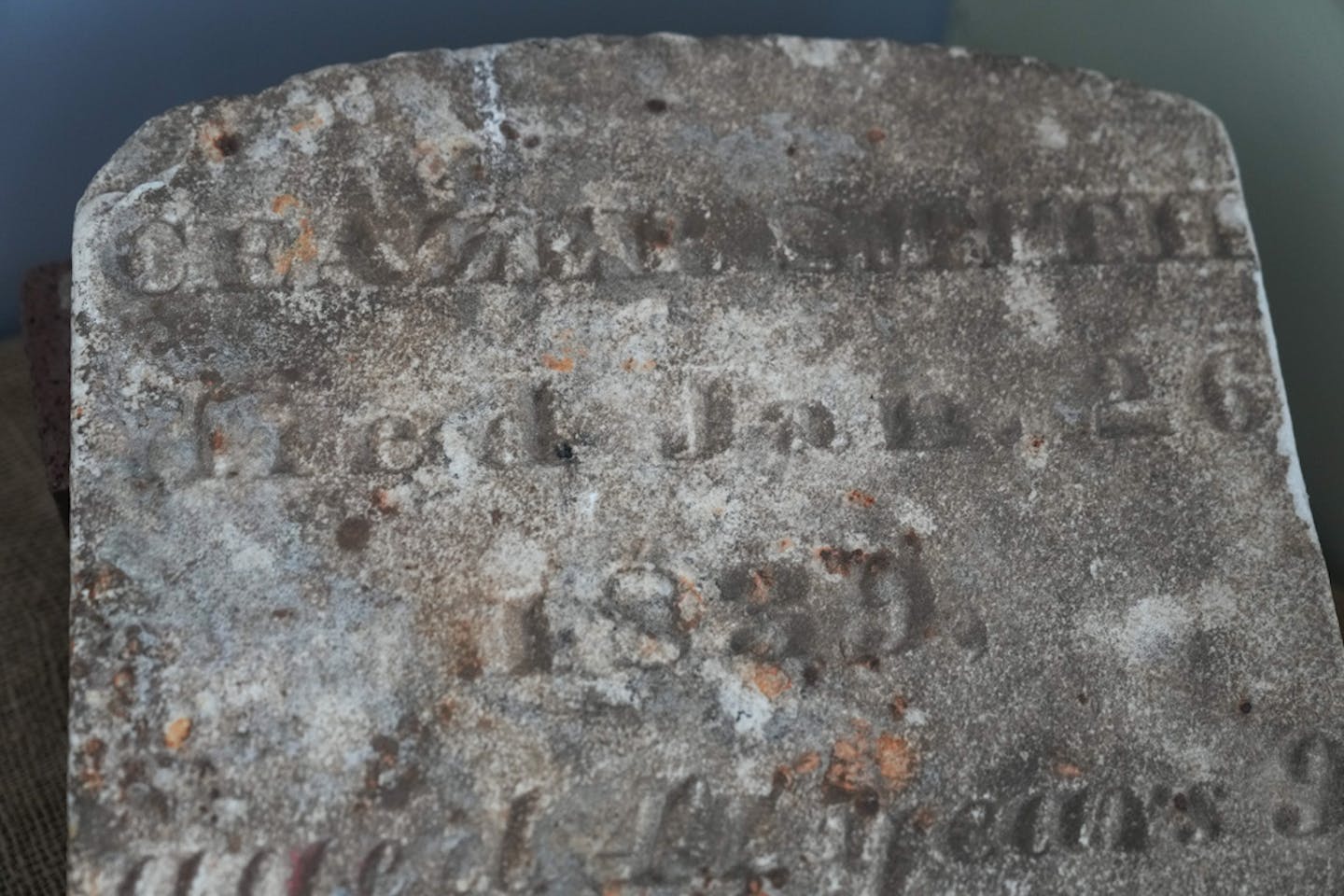 An old, faded tombstone.