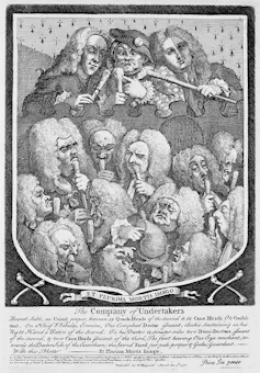 A cartoon of undertakers in wigs.